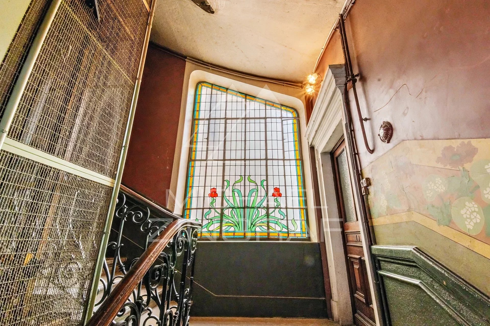 Superbe appartement d'angle dans immeuble Haussmannien